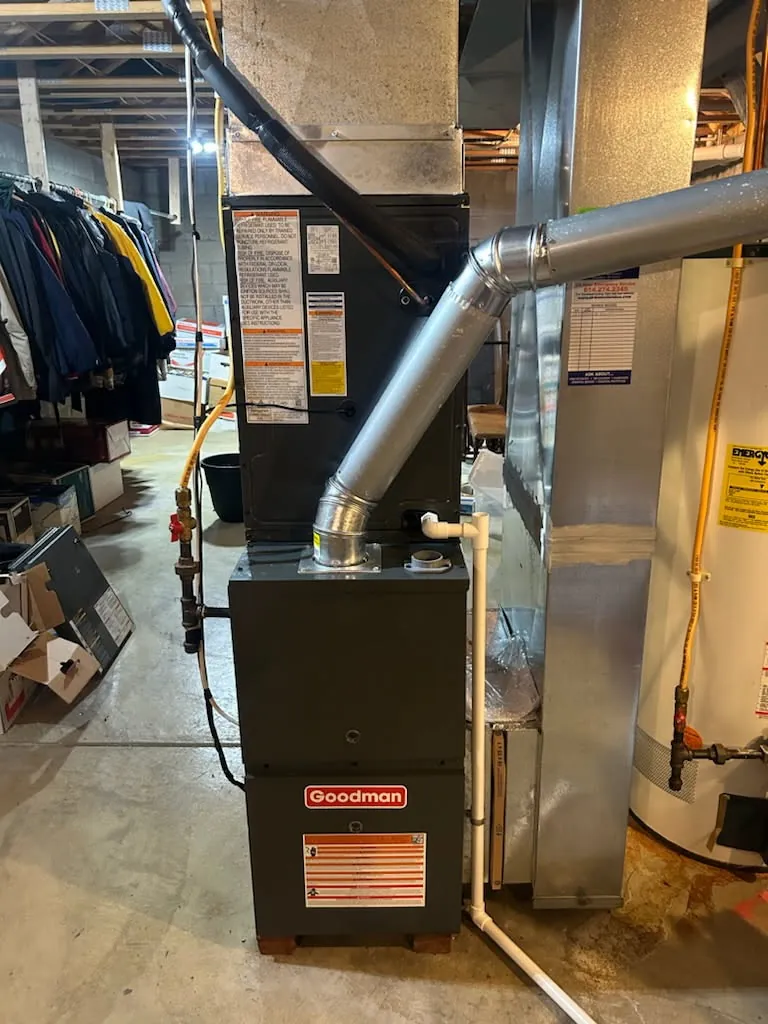 Goodman high-efficiency furnace installed by Ben Smith in a Columbus basement